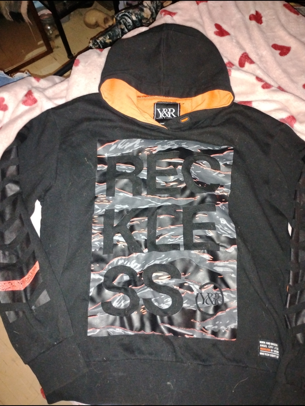 Young & Reckless Black Hoodie with Orange Hood Lining and Graphic Front